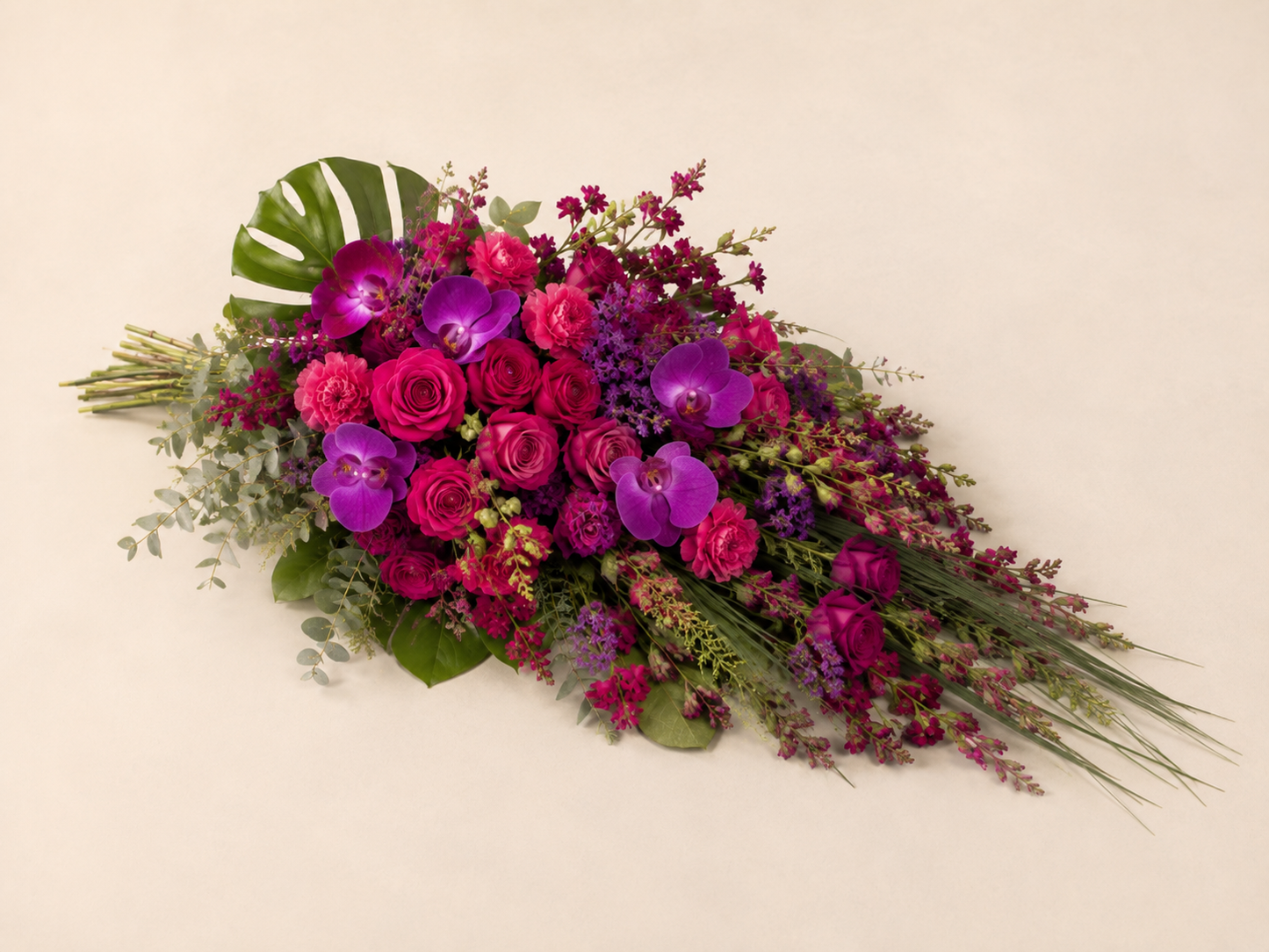 Fuchsia & Purple Funeral Sheaf | Elegant Sympathy Bouquet Online