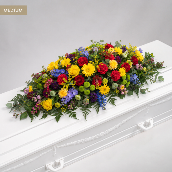 Colourful Coffin Spray | Elegant Funeral Flowers coffin spray delivery in Denmark