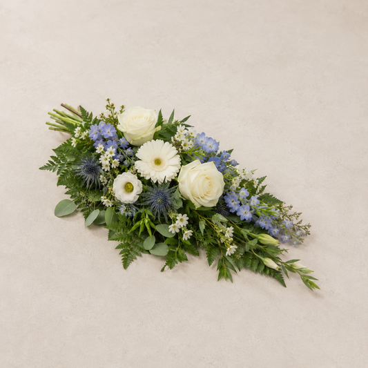 Blue & White Funeral Sheaf | Peaceful Casket Bouquet Online