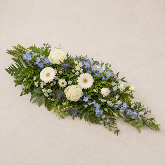 Blue & White Funeral Sheaf | Peaceful Casket Bouquet Online