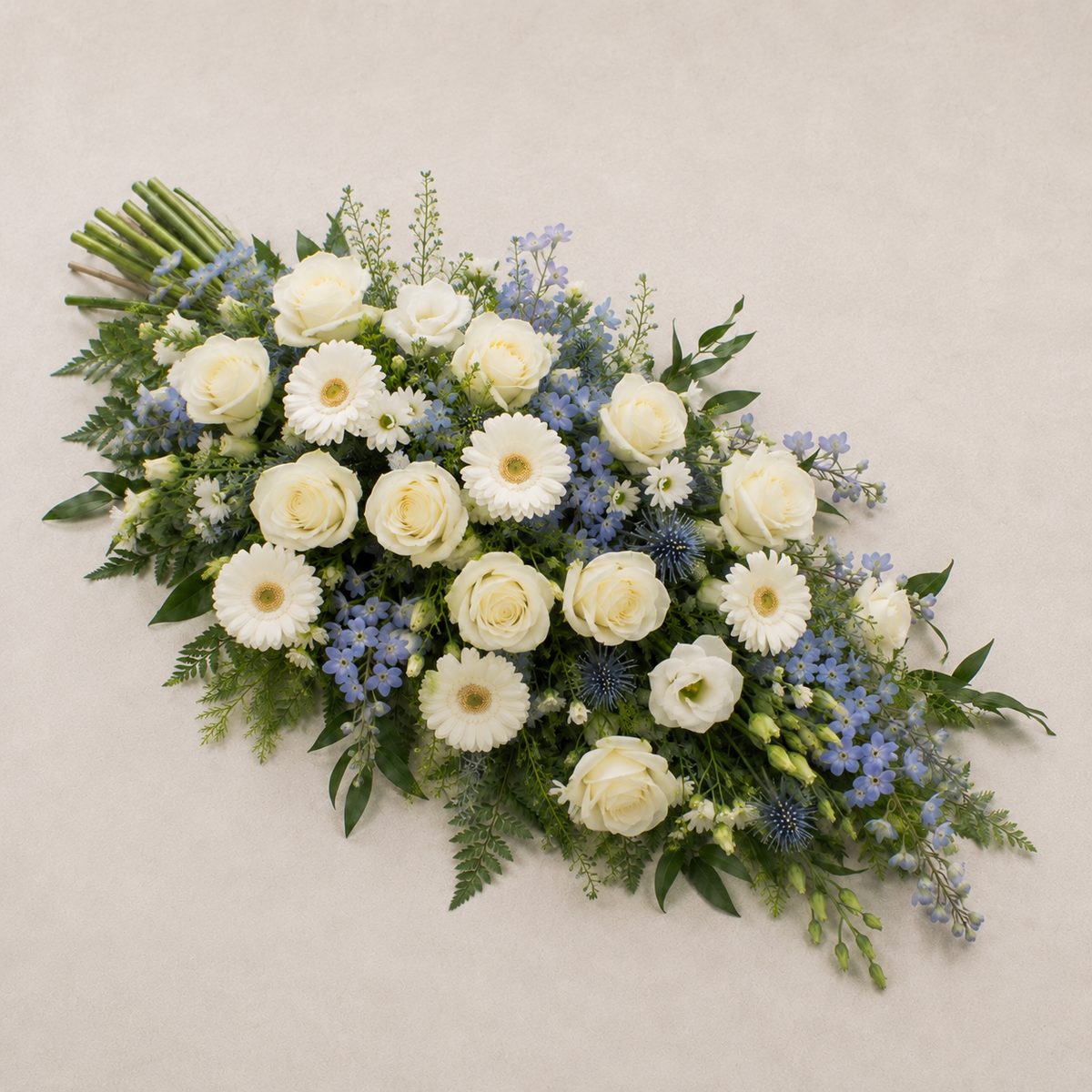 Blue & White Funeral Sheaf | Peaceful Casket Bouquet Online