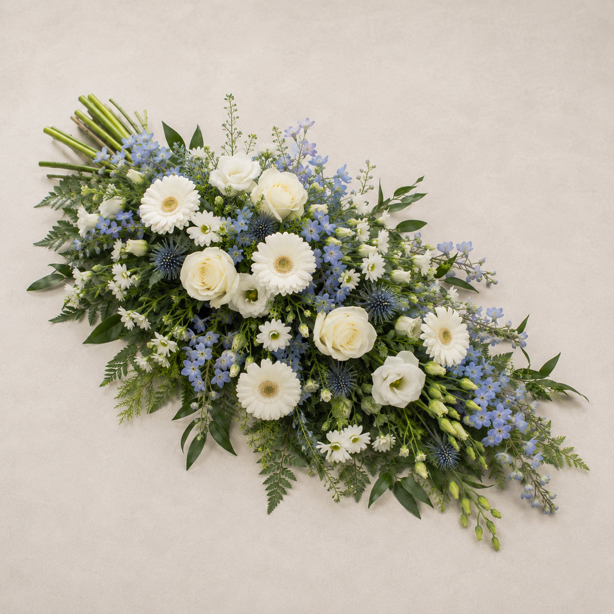 White & Blue Funeral Sheaf | Peaceful Sympathy Bouquet Online