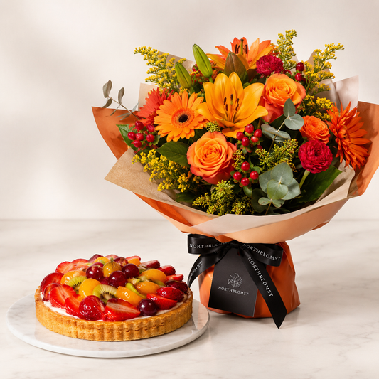 Orange Mixed Flower Bouquet with Fruit Cake | Flowers & Cake Delivery
